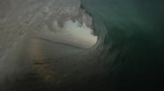 Surfing a Tube at Sunset
