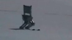 Skiing Robot Races Down Snow Slope
